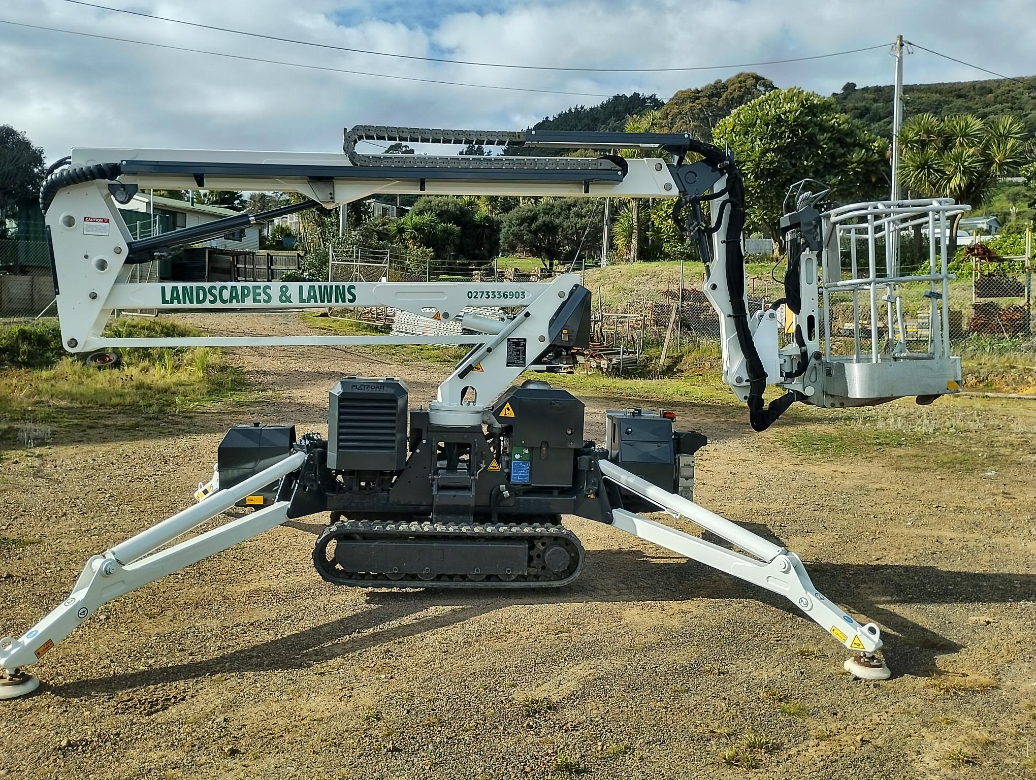 Landscapes and Lawns Spiderlift PB15.75 at work